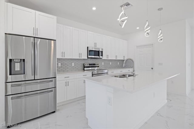 1508 Hibiscus Ave, Lehigh Acres, FL 33972 - kitchen with marble finish floor, visible vents, a sink, and appliances with stainless steel finishes