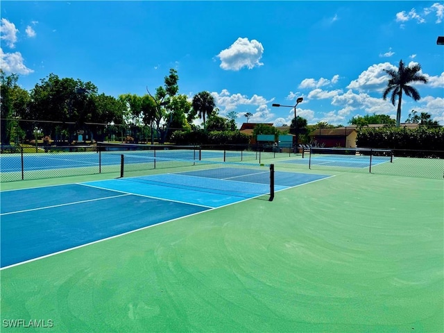 17304 Timber Oak Ln, Fort Myers, FL 33908 - view of tennis court featuring fence