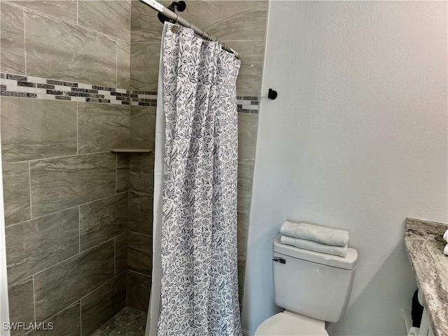 17304 Timber Oak Ln, Fort Myers, FL 33908 - bathroom with a shower stall and toilet