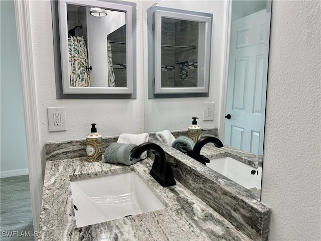 17304 Timber Oak Ln, Fort Myers, FL 33908 - full bathroom with a textured wall and vanity