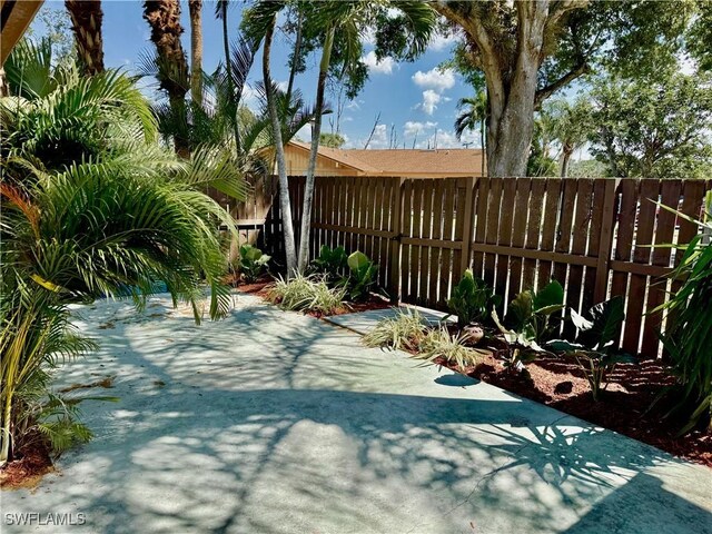 17304 Timber Oak Ln, Fort Myers, FL 33908 - view of patio featuring fence