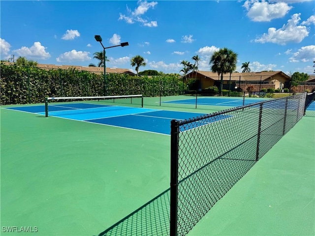 17304 Timber Oak Ln, Fort Myers, FL 33908 - view of tennis court with fence
