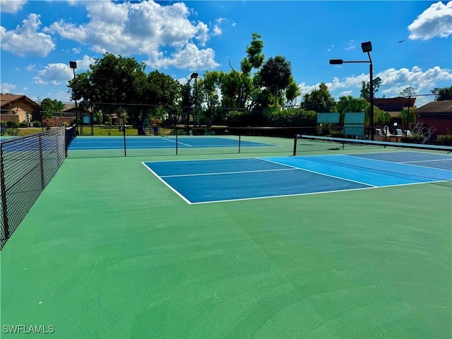 17304 Timber Oak Ln, Fort Myers, FL 33908 - view of tennis court with fence
