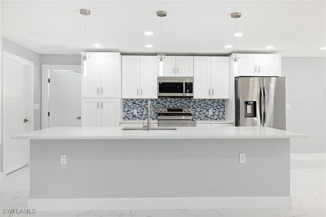 kitchen with marble finish floor, a sink, recessed lighting, and appliances with stainless steel finishes
