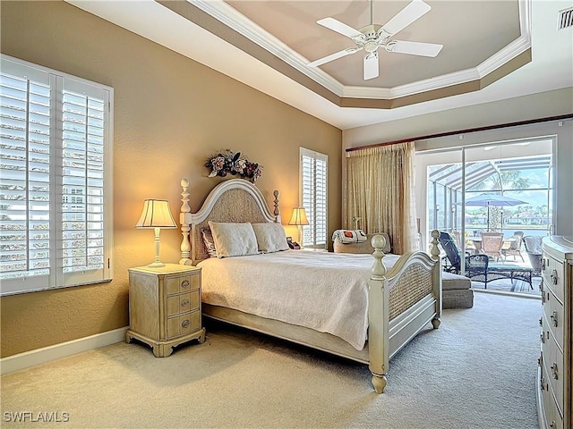 13011 Milford Pl, Fort Myers, FL 33913 - bedroom featuring visible vents, ornamental molding, access to outside, and a raised ceiling