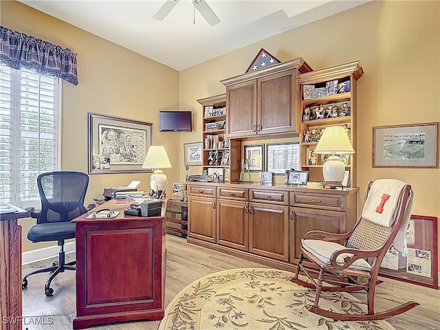 13011 Milford Pl, Fort Myers, FL 33913 - home office with a healthy amount of sunlight, light wood-style floors, and a ceiling fan