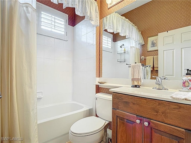 13011 Milford Pl, Fort Myers, FL 33913 - full bathroom featuring wallpapered walls, toilet, shower / tub combo with curtain, and vanity