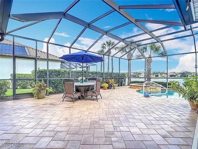 13011 Milford Pl, Fort Myers, FL 33913 - view of patio / terrace with glass enclosure, an outdoor pool, and a hot tub