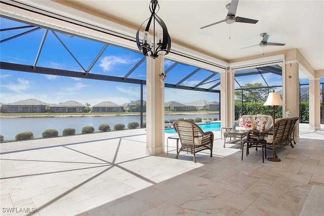 14364 Neptune Ave, Naples, FL 34114 - view of patio featuring glass enclosure, an outdoor pool, a water view, a ceiling fan, and an outdoor living space