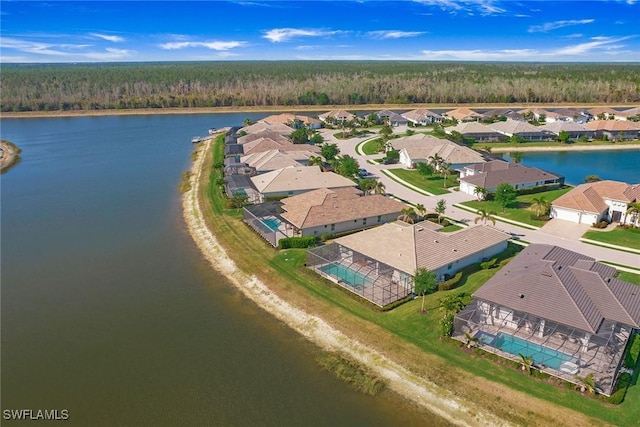 14364 Neptune Ave, Naples, FL 34114 - aerial perspective of suburban area with a forest and a large body of water