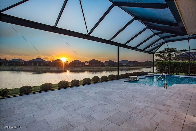 14364 Neptune Ave, Naples, FL 34114 - outdoor pool with a patio, a water view, and a lanai