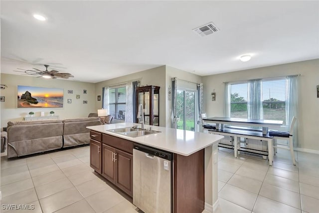 2701 NW Embers Ter, Cape Coral, FL 33993 - kitchen with a sink, stainless steel dishwasher, a center island with sink, open floor plan, and visible vents