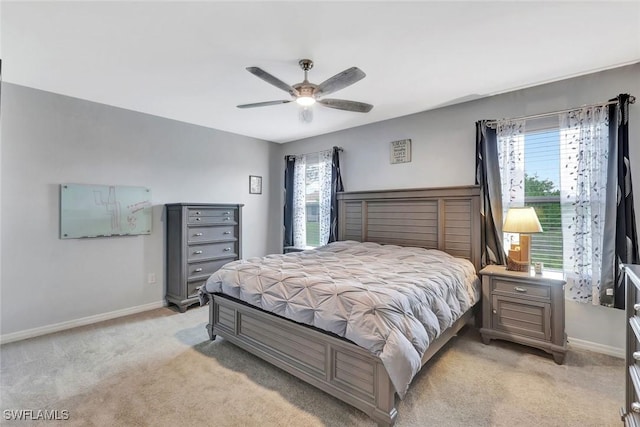 2701 NW Embers Ter, Cape Coral, FL 33993 - bedroom featuring light colored carpet, ceiling fan, and baseboards