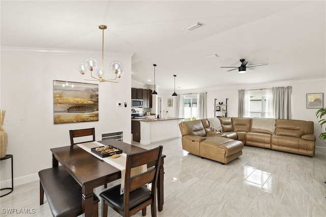 713 NE 31st Ter, Cape Coral, FL 33909 - dining room featuring crown molding, ceiling fan with notable chandelier, baseboards, marble finish floor, and visible vents