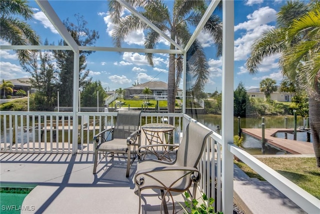 sunroom with a water view