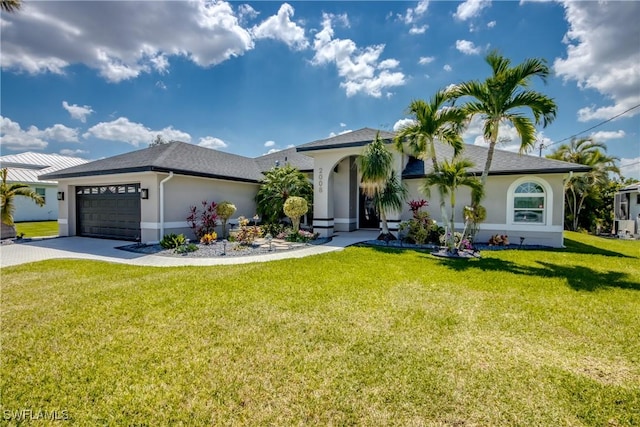 view of front facade with stucco siding, an attached garage, concrete driveway, and a front yard