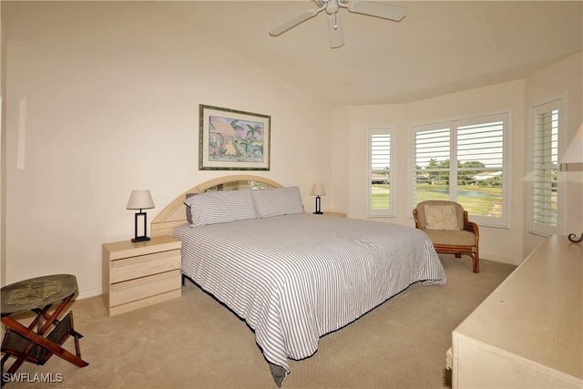 20700 Country Creek Dr Unit 823, Estero, FL 33928 - bedroom featuring ceiling fan, vaulted ceiling, light carpet, and baseboards