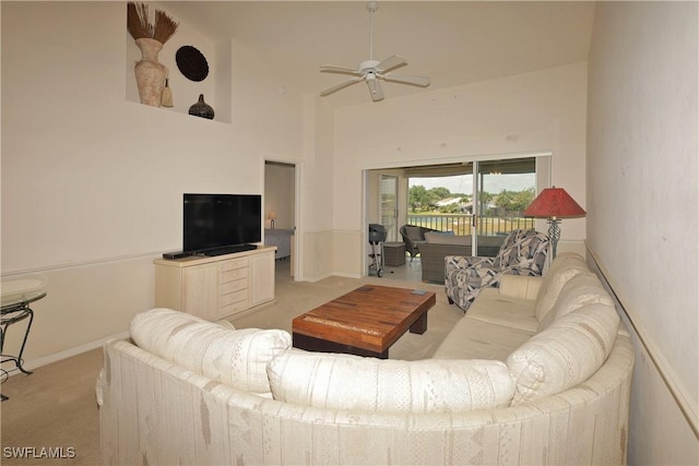 20700 Country Creek Dr Unit 823, Estero, FL 33928 - living area with ceiling fan, high vaulted ceiling, carpet flooring, and baseboards