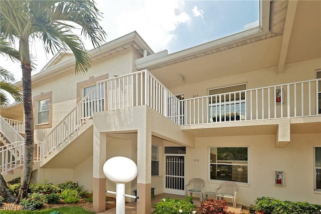 20700 Country Creek Dr Unit 823, Estero, FL 33928 - view of building exterior featuring stairway