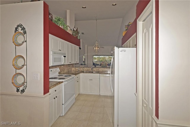 20700 Country Creek Dr Unit 823, Estero, FL 33928 - kitchen featuring light tile patterned floors, white cabinetry, white appliances, and a notable chandelier