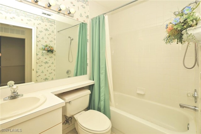 20700 Country Creek Dr Unit 823, Estero, FL 33928 - full bath with vanity, shower / bath combo with shower curtain, toilet, visible vents, and wallpapered walls