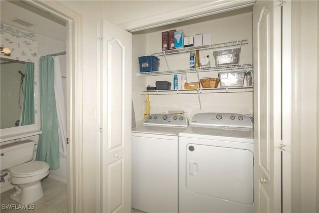 20700 Country Creek Dr Unit 823, Estero, FL 33928 - laundry room with visible vents, laundry area, and washing machine and dryer