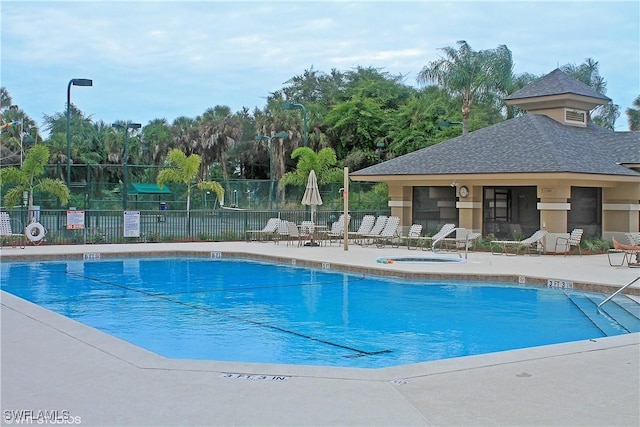 20700 Country Creek Dr Unit 823, Estero, FL 33928 - pool featuring fence and a patio area