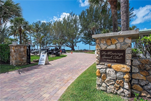 view of community featuring decorative driveway