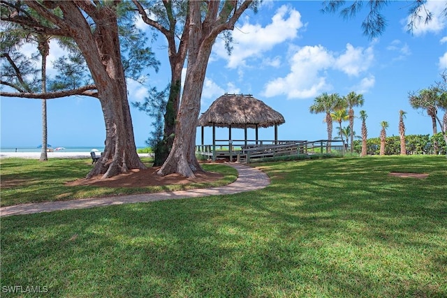 view of community with a gazebo and a lawn