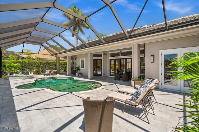 3911 Lakemont Dr, Bonita Springs, FL 34134 - pool with french doors, glass enclosure, ceiling fan, and a patio area