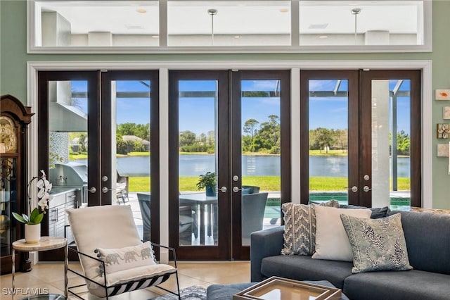 3911 Lakemont Dr, Bonita Springs, FL 34134 - sunroom featuring a water view and french doors