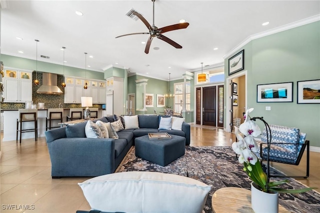 3911 Lakemont Dr, Bonita Springs, FL 34134 - living area featuring light tile patterned flooring, visible vents, crown molding, recessed lighting, and a ceiling fan