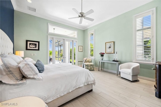 3911 Lakemont Dr, Bonita Springs, FL 34134 - bedroom with access to exterior, visible vents, multiple windows, and wood finished floors