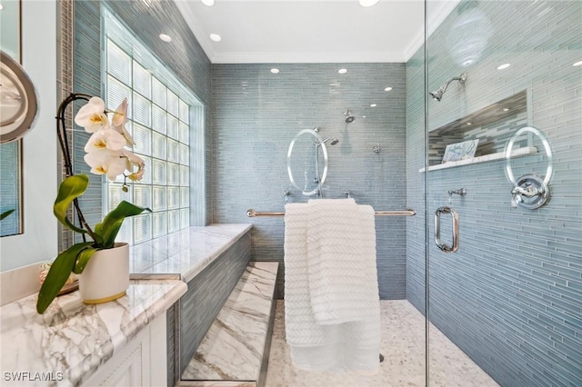 3911 Lakemont Dr, Bonita Springs, FL 34134 - full bathroom with marble finish floor, ornamental molding, and a tile shower