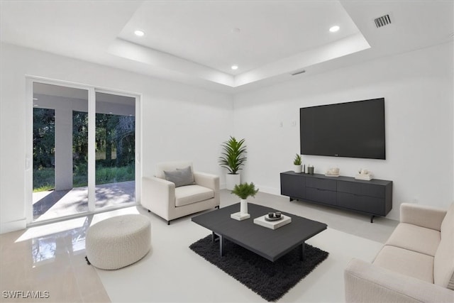 150 Bell Blvd S, Lehigh Acres, FL 33974 - living area with a raised ceiling, visible vents, and recessed lighting