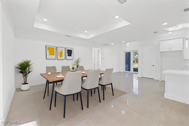 150 Bell Blvd S, Lehigh Acres, FL 33974 - dining area with baseboards, recessed lighting, and a raised ceiling