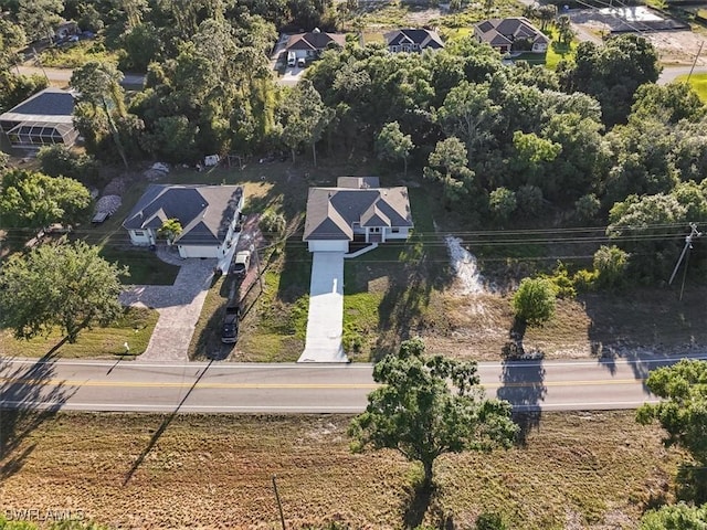 150 Bell Blvd S, Lehigh Acres, FL 33974 - bird's eye view with a residential view