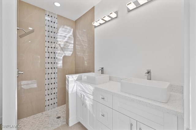 150 Bell Blvd S, Lehigh Acres, FL 33974 - bathroom featuring double vanity, a sink, and a walk in shower