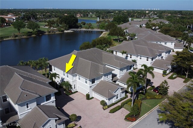 14561 Bellino Ter Unit 101, Bonita Springs, FL 34135 - birds eye view of property featuring a water view and a residential view