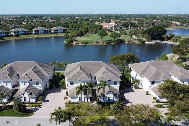 14561 Bellino Ter Unit 101, Bonita Springs, FL 34135 - drone / aerial view featuring a water view and a residential view
