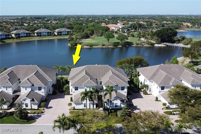 14561 Bellino Ter Unit 101, Bonita Springs, FL 34135 - bird's eye view featuring a water view and a residential view