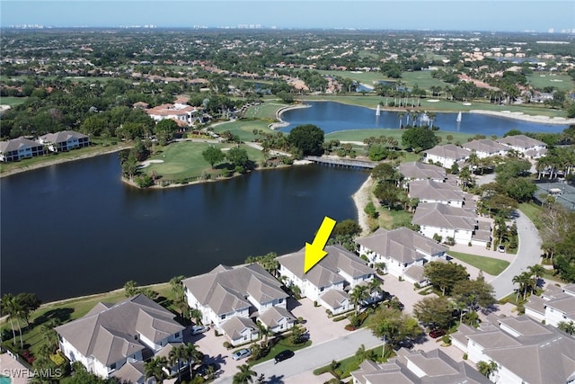 14561 Bellino Ter Unit 101, Bonita Springs, FL 34135 - drone / aerial view featuring a residential view, golf course view, and a water view