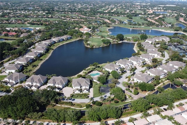 14561 Bellino Ter Unit 101, Bonita Springs, FL 34135 - drone / aerial view featuring a water view and a residential view