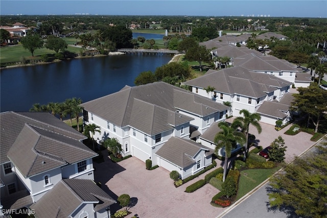 14561 Bellino Ter Unit 101, Bonita Springs, FL 34135 - drone / aerial view with a residential view and a water view