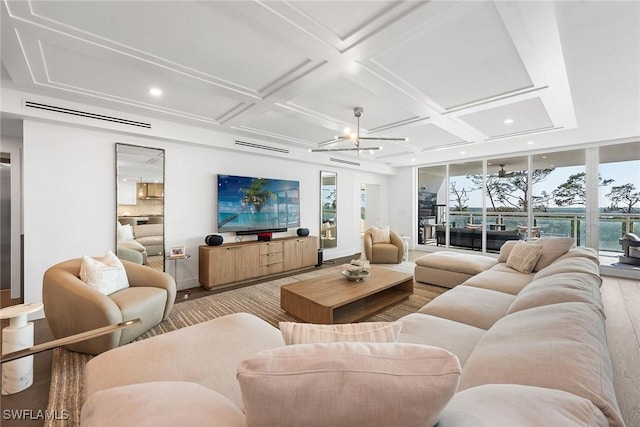 living room with a chandelier, coffered ceiling, baseboards, and recessed lighting