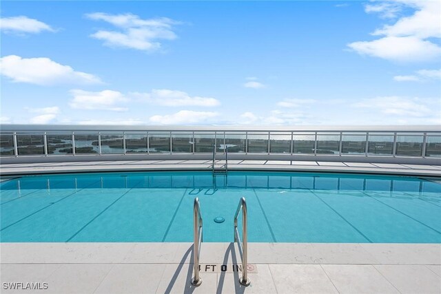 community pool with fence