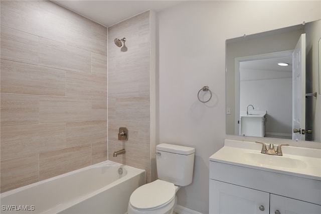 full bathroom featuring toilet, vanity, and shower / bathtub combination