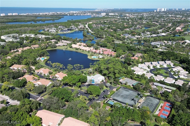 15450 Cedarwood Ln Unit 103, Naples, FL 34110 - drone / aerial view featuring a residential view and a water view