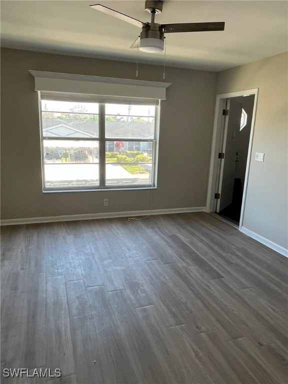 6824 Sandtrap Dr Unit 4, Fort Myers, FL 33919 - interior space featuring baseboards, ceiling fan, and dark wood finished floors