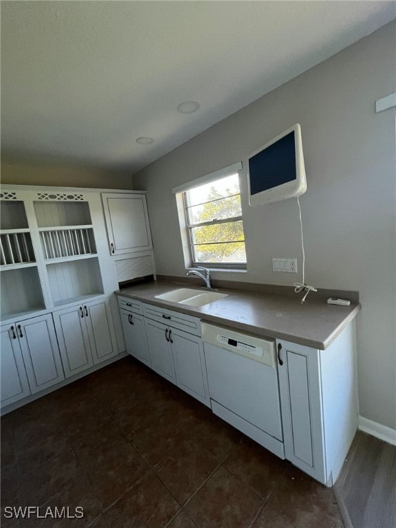 6824 Sandtrap Dr Unit 4, Fort Myers, FL 33919 - kitchen with white cabinetry, white dishwasher, and a sink